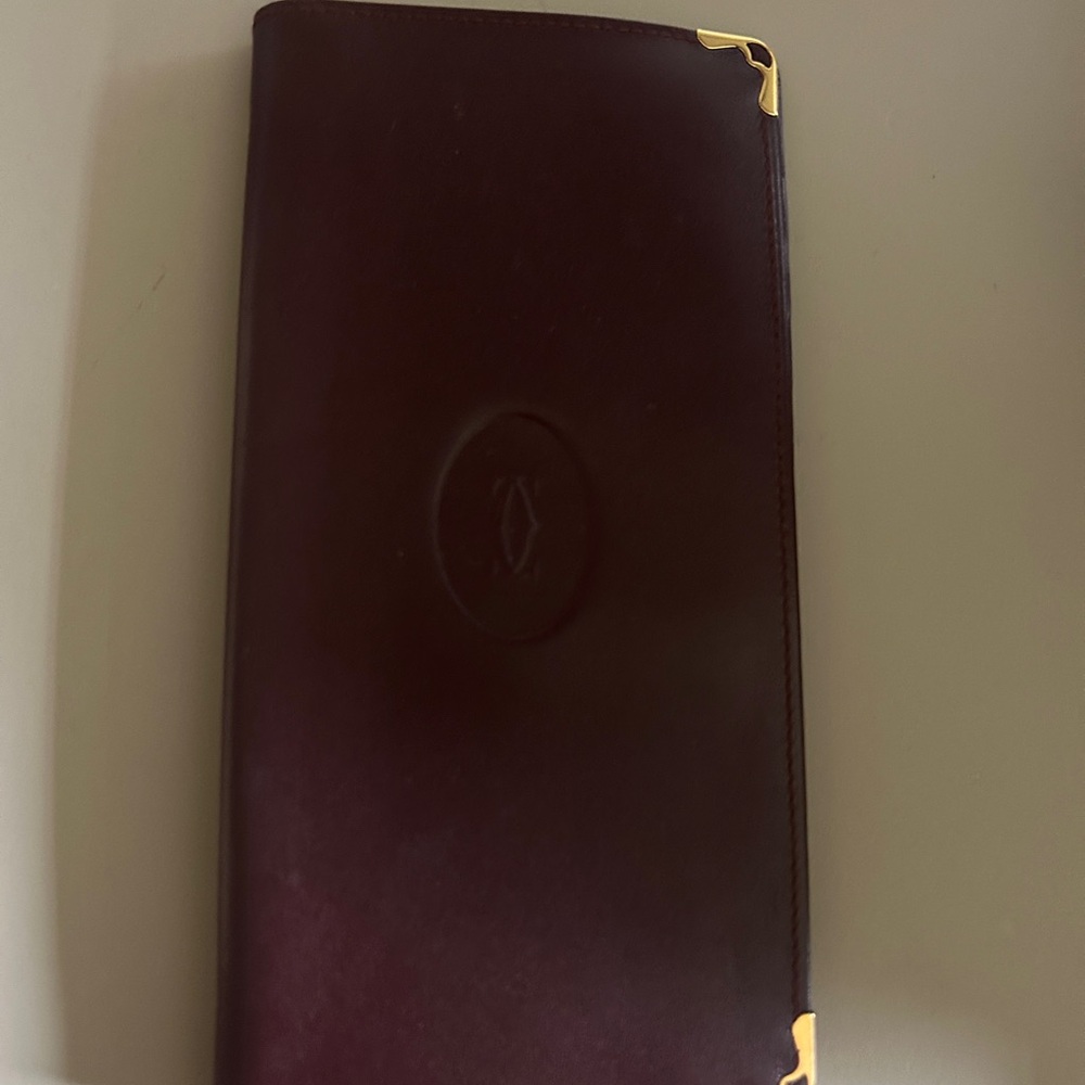 Authentic Cartier Burgundy Leather Wallet with Gold Accents